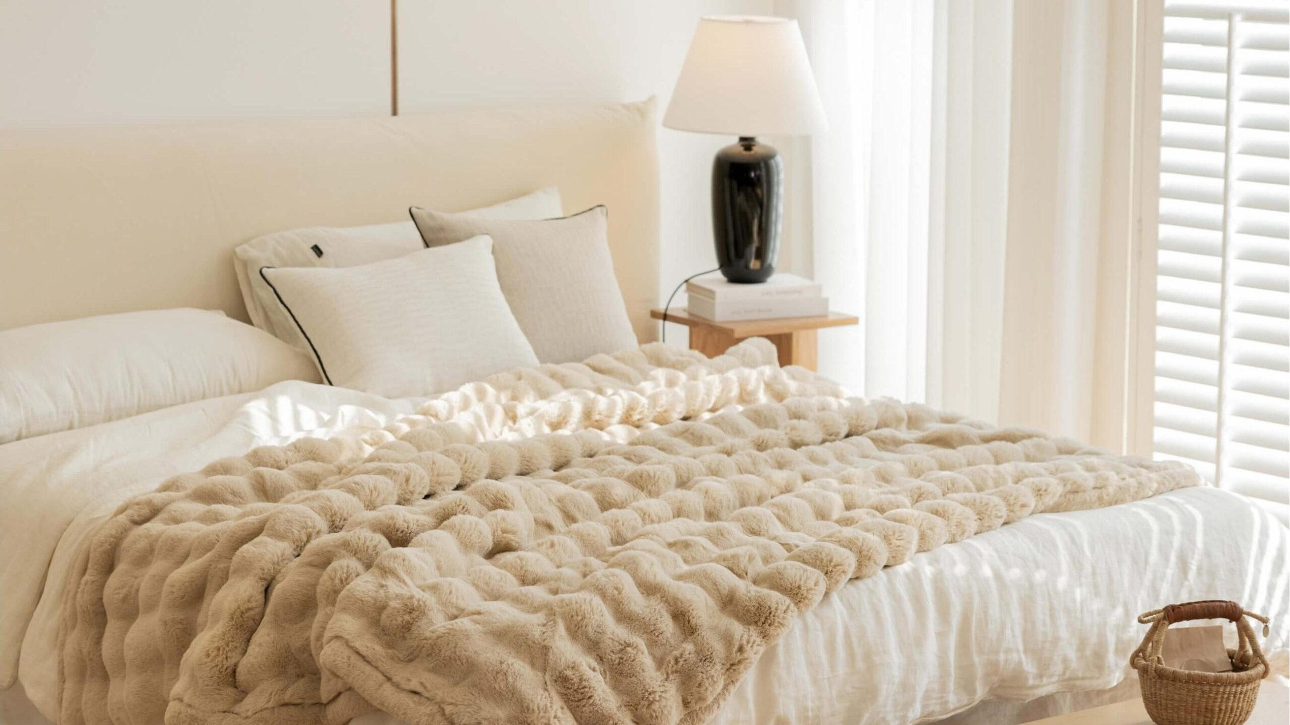 How Does The Faux Rabbit Fur Blanket Feel In Terms Of Softness And Texture?